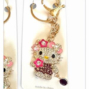 Sanrio Hello Kitty Keychain with Gold and deep Pink Crystal Accents bag charm